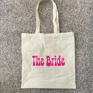 The Bride Canvas Tote Bag - Cream with Pink Text